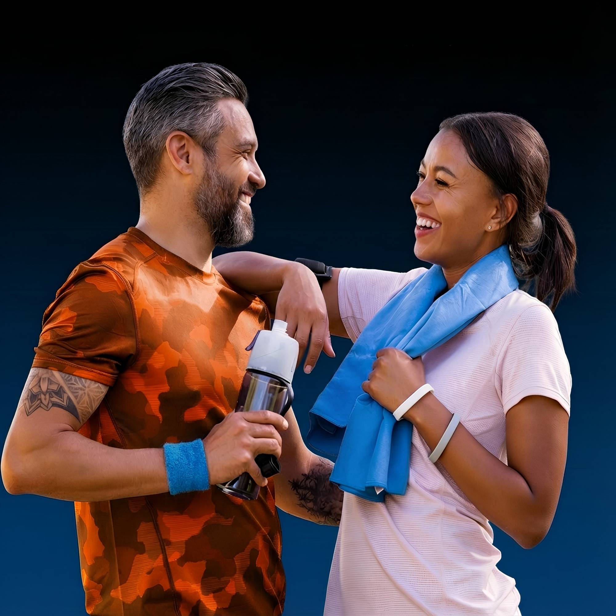 Active couple smiling after exercise, representing pain relief, recovery, and regenerative medicine at LeHeal Biogenix.